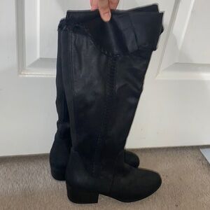 Tall black boots